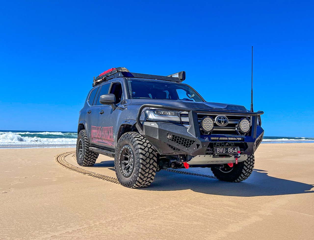 Toro 300 Series Landcruiser with bullbar, parked on beach